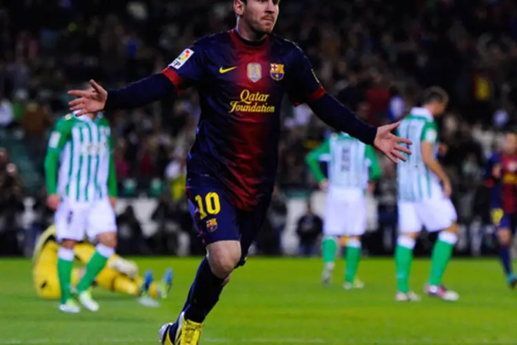 
	Lionel Messi comemora depois de marcar o primeiro gol contra o Betis: em novembro, ele j&aacute; havia superado o lend&aacute;rio Pel&eacute;, que em 1958 marcou 75 gols
 (David Ramos/Getty Images)