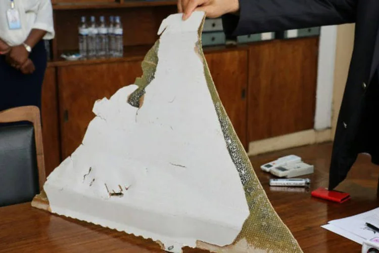 
	MH370: a avalia&ccedil;&atilde;o das duas pe&ccedil;as mostrou que elas coincidem com as caracter&iacute;sticas de pain&eacute;is de um Boeing 777 da Malaysia Airlines
 (Adrien Barbier / AFP)