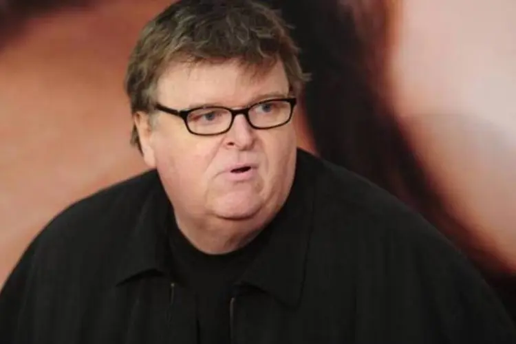 
	Michael Moore: Moore atribuiu a doen&ccedil;a a uma programa&ccedil;&atilde;o extenuante de promo&ccedil;&atilde;o do filme
 (AFP/Emmanuel Dunand)