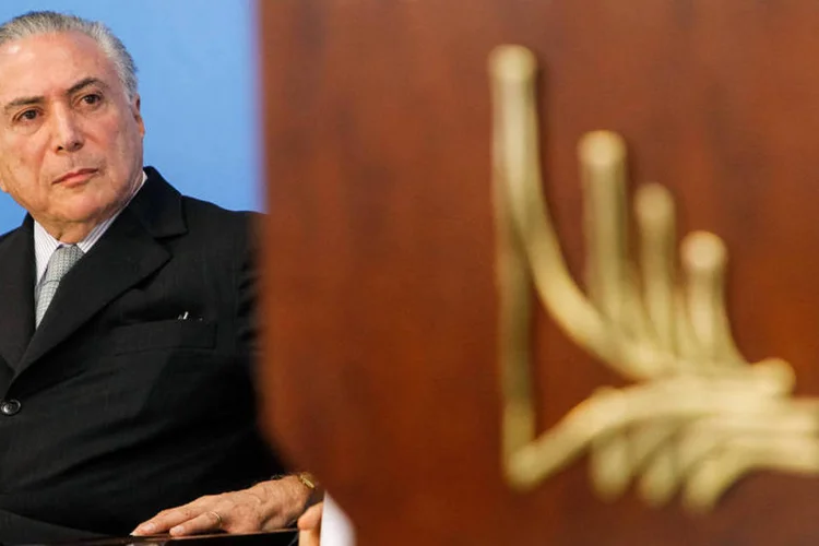 
	Michel Temer: presidente interino recebeu pelo menos sete senadores indecisos sobre impeachment e prometeu destravar obras nas bases eleitorais
 (Beto Barata/PR)