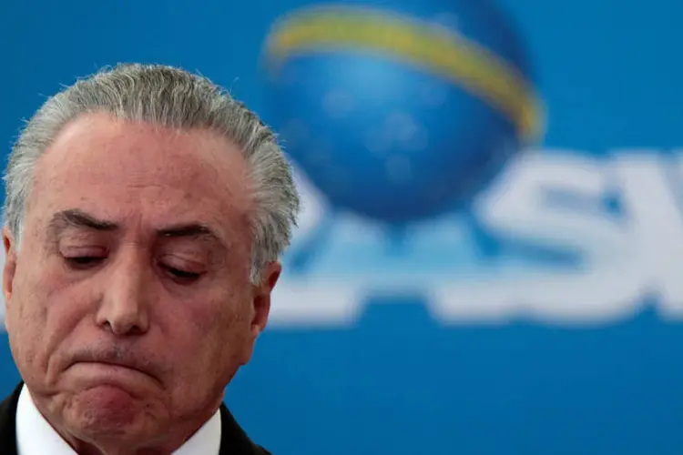 
	Michel Temer: presidente interino teria recebido relat&oacute;rio que mostra que sua gest&atilde;o n&atilde;o &eacute; bem vista no exterior
 (Ueslei Marcelino / Reuters)