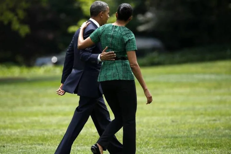 O casal Michelle e Barack Obama: Obama parece ter uma sede cada vez maior de ar livre (Kevin Lamarque/Reuters)