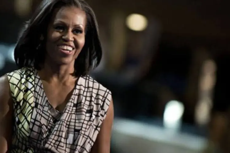 
	Michelle Obama: Michelle tamb&eacute;m reagiu positivamente &agrave; sugest&atilde;o de George Clooney para a miss&atilde;o
 (Brendan Smialowski/AFP)