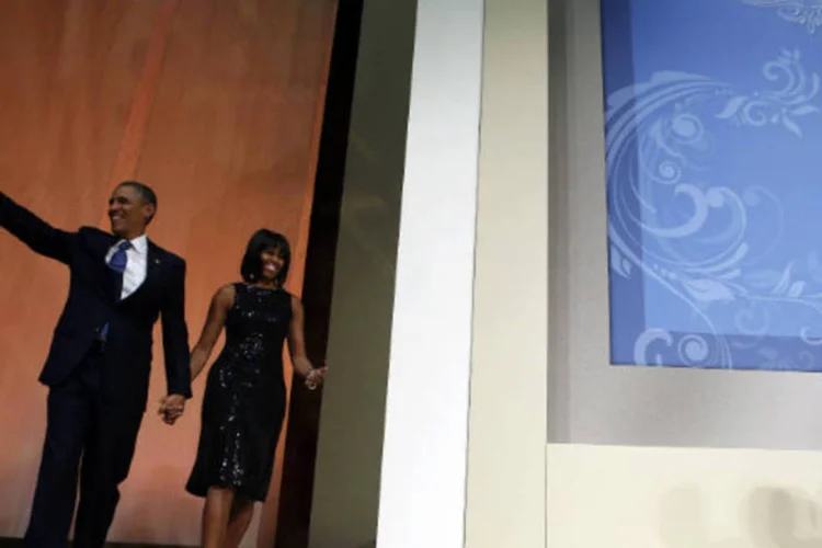 Barack e Michelle Obama: nestes quatro anos a primeira-dama soube conseguir um estilo que lhe cai muito bem, deixando clara sua própria personalidade (REUTERS/Larry Downing)