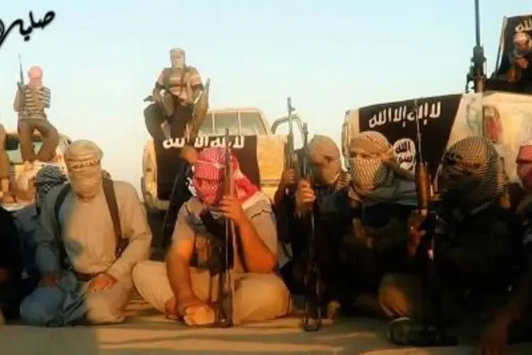 
	Militantes do EIIL: extremistas publicam revista na qual divulgam sua ideologia
 (AFP)