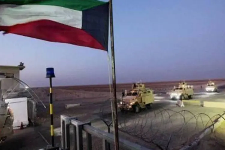 O último comboio militar americano deixa o Iraque e atravessa a fronteira do Kuwait (AFP/Getty Images/Arquivo/Mario Tama)