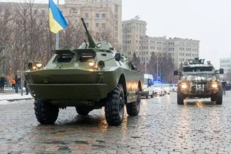 
	Militares patrulham a cidade ucraniana de Kharkiv: Alian&ccedil;a Atl&acirc;ntica n&atilde;o informou os motivos da convoca&ccedil;&atilde;o para a reuni&atilde;o da comiss&atilde;o Otan-Ucr&acirc;nia
 (Sergey Bobok/AFP)