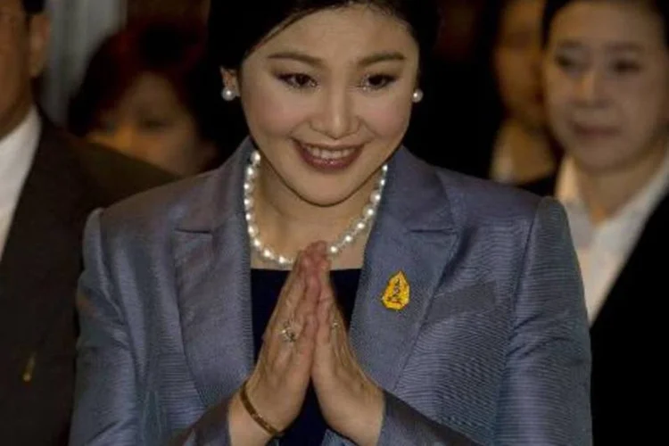 A primeira-ministra tailandesa, Yingluck Shinawatra: Yingluck é acusada de ter determinado a transferência de um alto funcionário para beneficiar seu partido (Pornchai Kittiwongsakul/AFP)