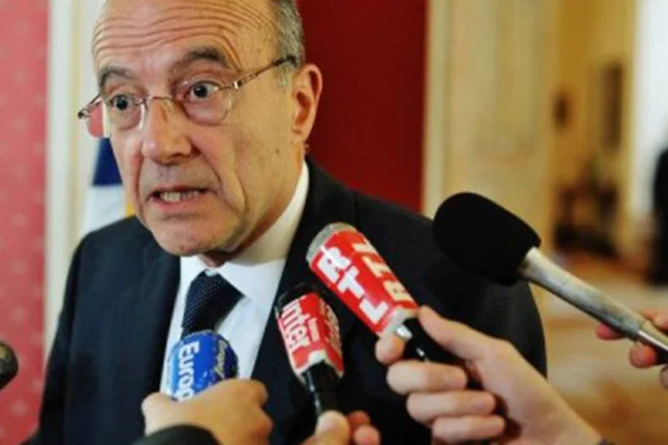 Roméo Langlois, correspondente na Colômbia da rede francesa 'France 24' e do jornal 'Le Figaro', 'foi sequestrado durante um enfrentamento entre as forças colombianas e as Farc e foi feito prisioneiro', disse Juppé em Lyon (©AFP / Mandel Ngan)