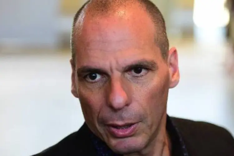 
	O ministro grego das Finan&ccedil;as, Yanis Varoufakis: &quot;Eu sou cronicamente otimista&quot;, disse Varoufakis em resposta a uma pergunta sobre o empr&eacute;stimo que vence no pr&oacute;ximo m&ecirc;s
 (AFP/ Emmanuel Dunand)