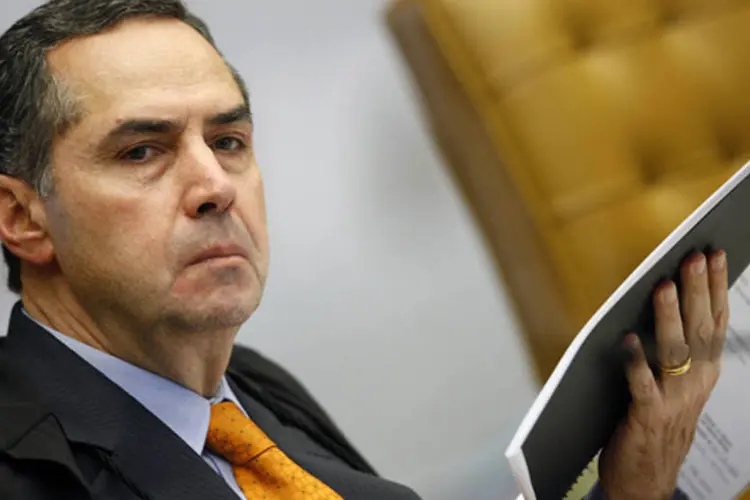 
	Barroso, que &eacute; defensor do atual modelo, rebateu cr&iacute;ticas de que a indica&ccedil;&atilde;o feita pelo Planalto tamb&eacute;m corre o risco de ser politizada
 (Nelson Jr./SCO/STF)