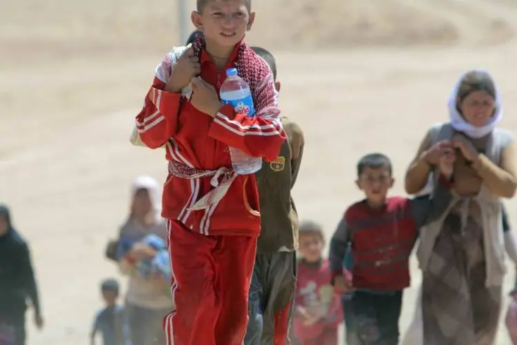 
	Crist&atilde;o da minoria Yazidi foge do Iraque e vai para o Curdist&atilde;o
 (Reuters/Rodi Said)