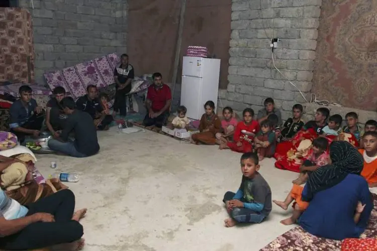 Refugiados da minoria Yazidi fugiram do Estado Islâmico na cidade de Mossul, no Iraque, e se refugiam em Dohuk (Reuters/Ari Jalal)
