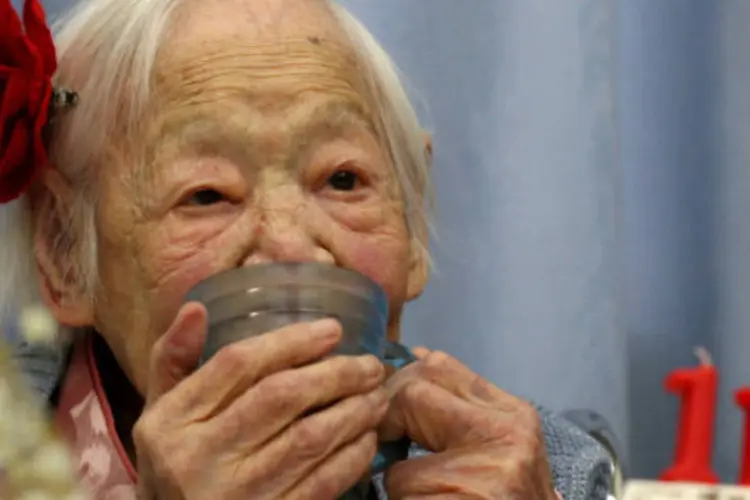 Misao Okawa, mulher mais velha do mundo, na comemoração dos seus 116 anos: "é muito tempo", disse, ao comentar sobre o aniversário (Getty Images)