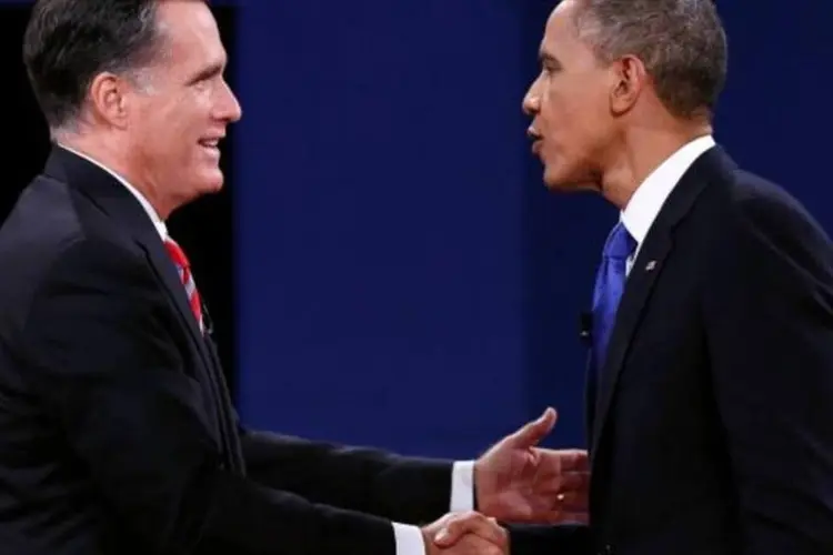 
	Mitt Romney e Barack Obama no &uacute;ltimo debate presidencial dos EUA: na consulta anterior do Gallup, divulgada em 28 de outubro, Romney liderava com 51%, contra 46% de Obama
 (Kevin Lamarque/Reuters)