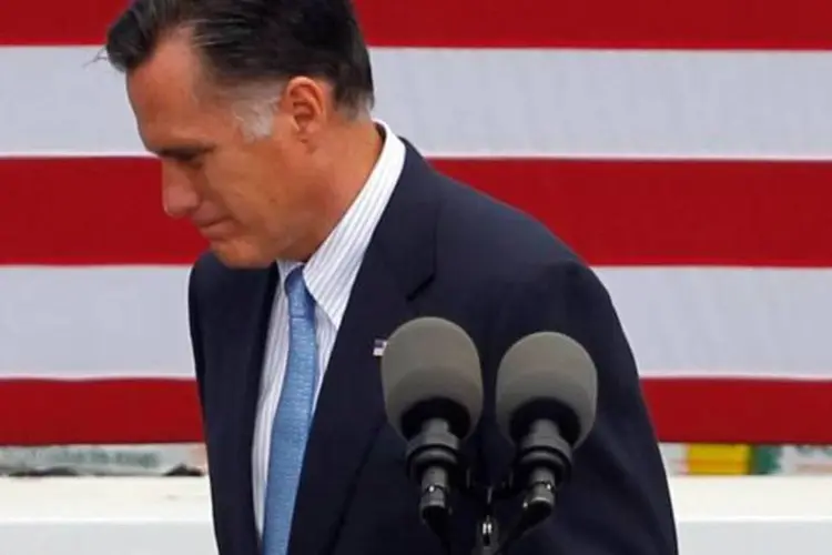 
	Candidato republicano Mitt Romney: se for eleito, disse Romney, &quot;n&atilde;o teremos opera&ccedil;&otilde;es policiais maci&ccedil;as para deportar imigrantes&quot;
 (Jessica Rinaldi/Reuters)