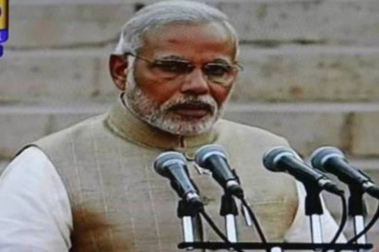 
	(Reprodu&ccedil;&atilde;o da TV) Modi presta juramento: chegada ao poder de Modi, l&iacute;der do partido nacionalista hindu Bharatiya Janata Party (BJP), representa uma guinada para a direita da &Iacute;ndia
 (DOORDARSHAN/AFP)