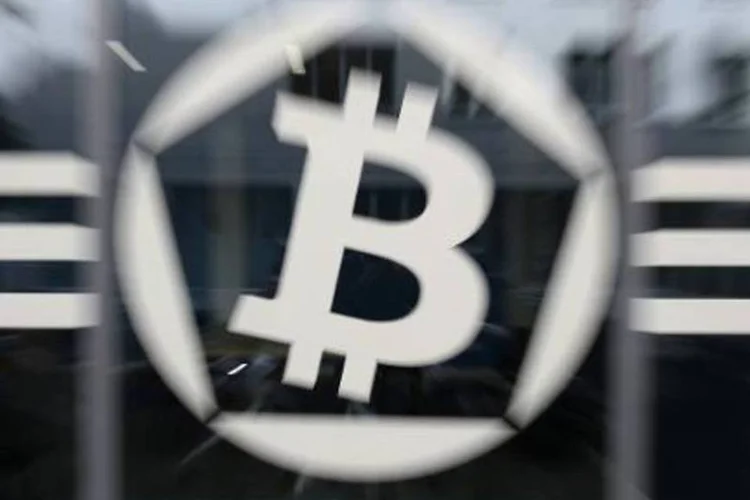 
	Bitcoin: Fukuda acabou sendo o respons&aacute;vel pela pol&iacute;tica de bitcoins do Jap&atilde;o
 (Stephane de Sakutin/AFP)