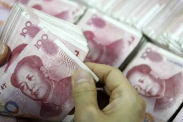 Iuane: a moeda da China, no ano passado, se valorizou constantemente frente ao dólar no mercado de câmbio nacional (AFP)