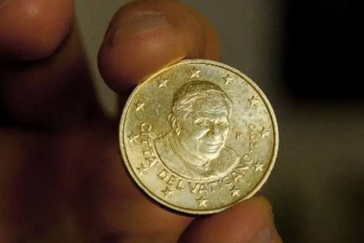 
	Imagem do Papa Bento XVI em moeda: 5 casos foram enviados ao Minist&eacute;rio P&uacute;blico
 (Vincenzo Pinto/AFP)