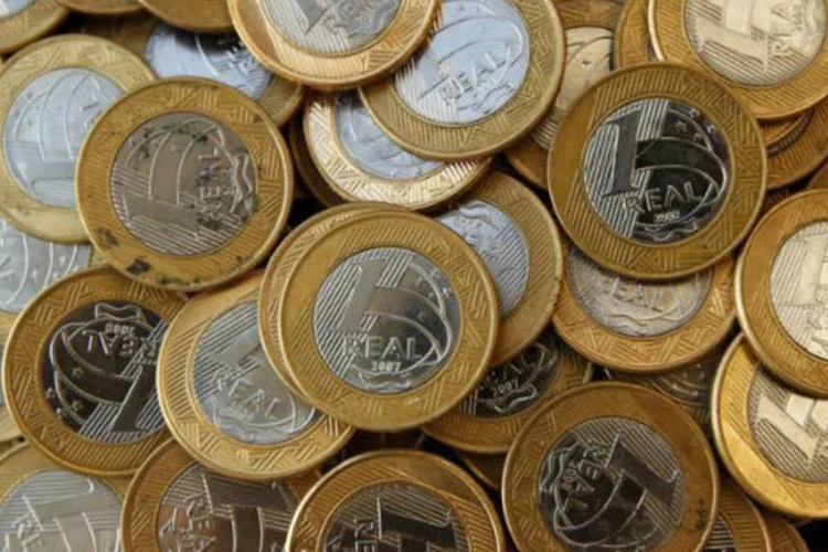 
	Dinheiro: gastos com compras p&uacute;blicas federais ficaram em R$ 68,4 bilh&otilde;es em 2013, 5,78% inferiores aos gastos de R$ 72,6 bilh&otilde;es registrados em 2012
 (REUTERS/Bruno Domingos)