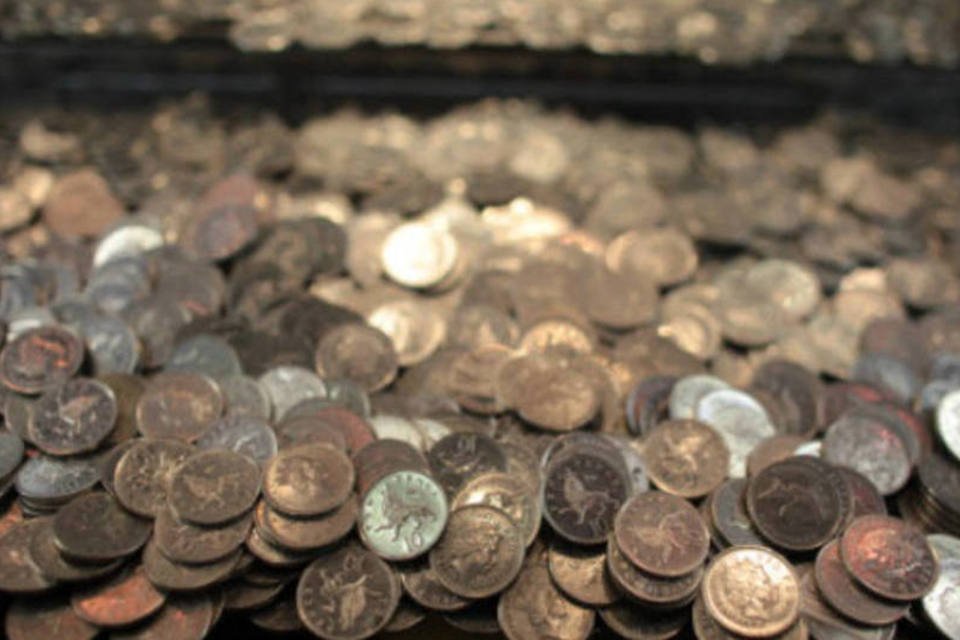 Equipe recupera 100 toneladas de moedas no Atlântico