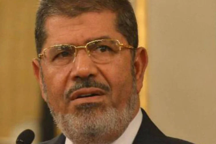 
	O ex-presidente eg&iacute;pcio Mohamed Mursi: &nbsp;julgamento de Mohmed Badie, de 70 anos, e de seguidores seus come&ccedil;a um dia depois de o mesmo tribunal, na prov&iacute;ncia de Minya, condenar &agrave; morte 529 membros do grupo isl&acirc;mico
 (AFP)