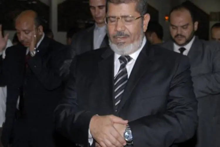 Mohamed Mursi: "A primeira vez que ouvi Mohamed Mursi dizer a verdade, foi quando declarou se sentir responsável pelo derramamento de sangue sírio", acrescentou (©AFP / -)
