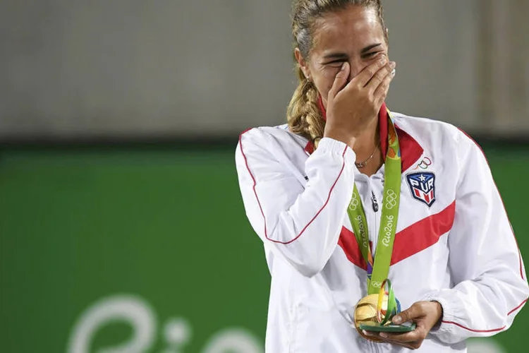 
	M&oacute;nica Puig: &quot;M&oacute;nica representa um orgulho e exemplo para Porto Rico, n&atilde;o s&oacute; por fazer hist&oacute;ria ao ganhar o ouro, mas tamb&eacute;m por sua humildade, determina&ccedil;&atilde;o e perseveran&ccedil;a&quot;
 (Toby Melville / Reuters)