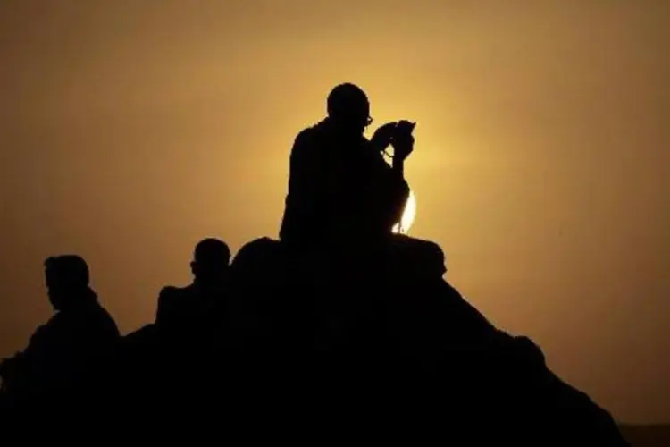 Peregrinos se reúnem no Monte Arafat para participar de um dos rituais do Hajj (Mohammed al-Shaikh/AFP)