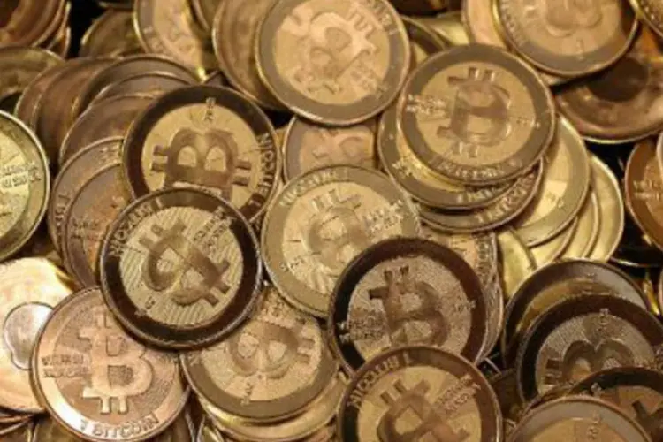 Bitcoin: moeda eletrônica, popular entre os internautas, está no auge, mas é altamente volátil (AFP)