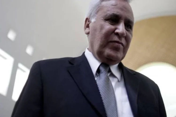 Katsav afirmou que o Estado estava condenando um inocente e que 'algum dia os israelenses compreenderão que hoje foi enterrado um homem vivo' (Uriel Sinai/Getty Images)