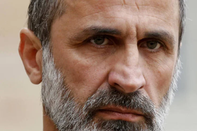 
	O l&iacute;der da oposi&ccedil;&atilde;o s&iacute;ria, Mouaz al-Khatib: apesar da participa&ccedil;&atilde;o na c&uacute;pula, a ren&uacute;ncia continua de p&eacute;
 (Benoit Tessier/Reuters)