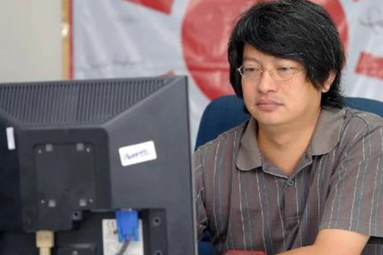 
	L&iacute;der de movimento contra o golpe, Sombat Boonngamanong: ativista foi detido ontem
 (Pornchai Kittiwongsakul/AFP)