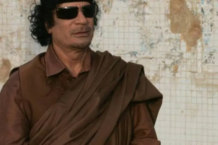 Kadafi: "A todos meus amados líbios, a terra líbia é vossa e tendes que defendê-la contra estes traidores, os cachorros" (Getty Images)