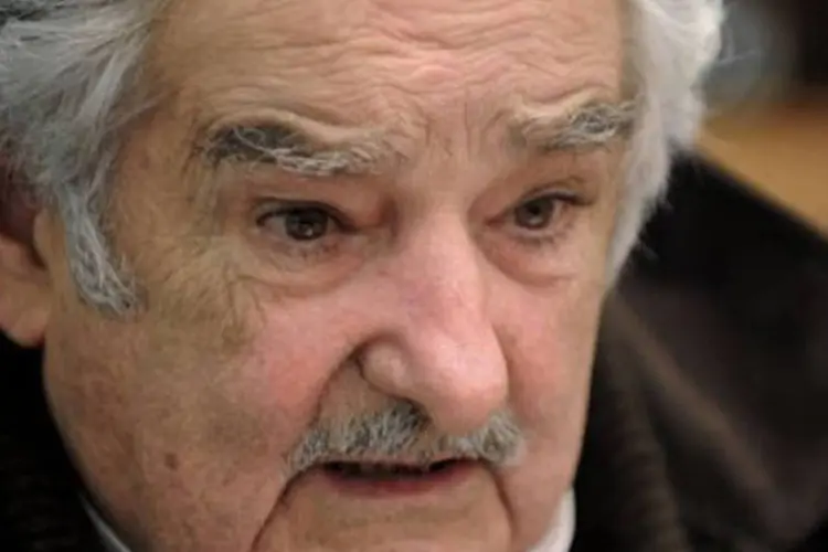 
	Jos&eacute; Mujica:das tr&ecirc;s reformas legais, a da maconha foi sem d&uacute;vida a mais chamativa e representou uma verdadeira queda de bra&ccedil;o com o modelo internacional de luta antidrogas
 (Miguel Rojo/AFP)