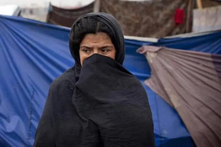 Mulher afegã: organizações humanitárias não querem centros geridos pelo governo (Majid Saeedi/Getty Images)