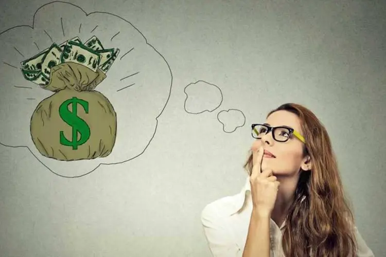 Mulher pensando em dinheiro (SIphotography/Thinkstock)