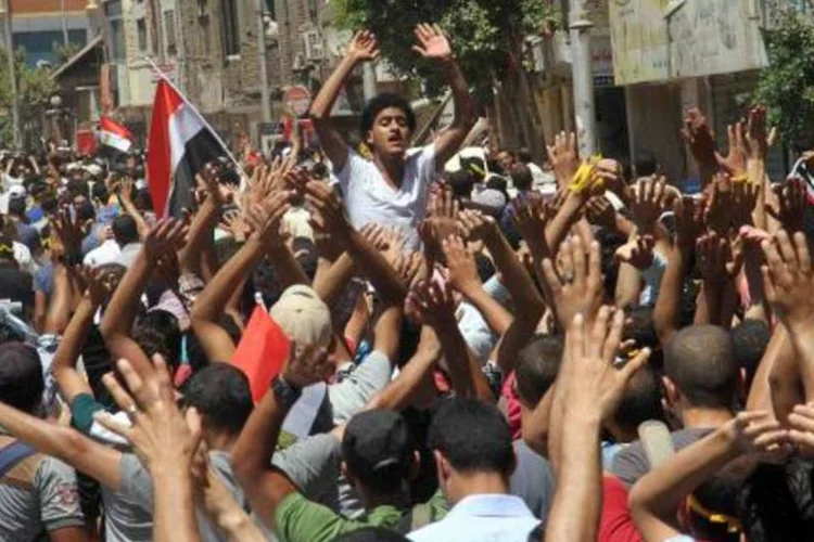 Seguidores de Mohamed Mursi, amparados pela Irmandade Muçulmana, fazem protesto (Khaled Kamel/AFP)