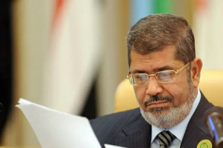 
	Mohamed Mursi: documento final do encontro pede&nbsp;&quot;a reconcilia&ccedil;&atilde;o e a prote&ccedil;&atilde;o da uni&atilde;o nacional das viol&ecirc;ncias sect&aacute;rias e dos grupos armados&quot;
 (AFP/ Fayez Nureldine)