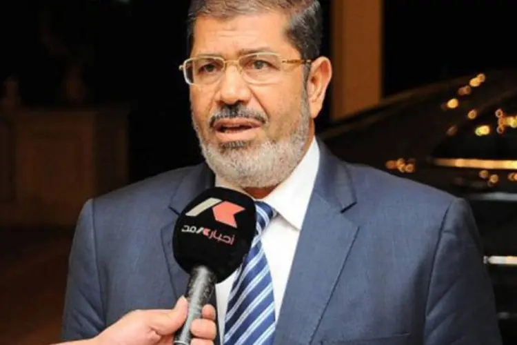 
	Mohamed Mursi presidente do Egito: ele reivindicou a convoca&ccedil;&atilde;o de uma reuni&atilde;o de urg&ecirc;ncia da Liga &Aacute;rabe assim como do Conselho de Seguran&ccedil;a da ONU
 (Egyptian Presidency/AFP)
