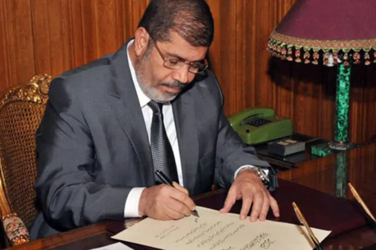 
	Mohamed Mursi: a NFS exige que Mursi assuma a responsabilidade pela viol&ecirc;ncia dos &uacute;ltimos dias.
 (©afp.com / Ho)