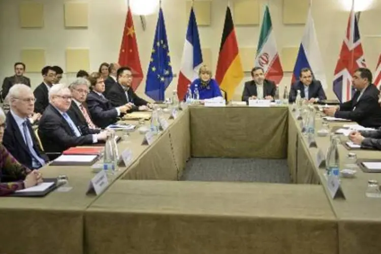 
	Diplomatas reunidos em Lausanne (Su&iacute;&ccedil;a) para negocia&ccedil;&otilde;es sobre o programa nuclear do Ir&atilde;
 (Brendan Smialowski/AFP)