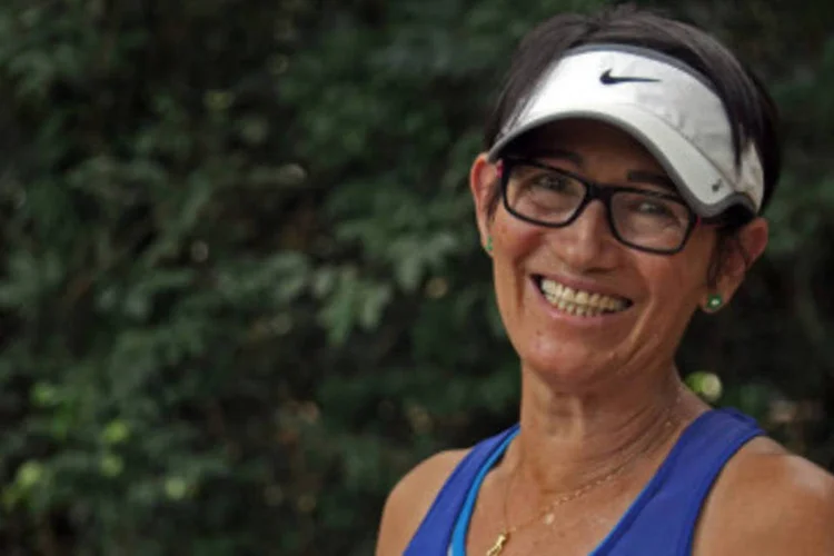 Neide: "Eu descobri que quem tinha assassinado meu filho foi uma criança de 14 anos. Pouco tempo depois, eu resolvi que ia cuidar dessas crianças" conta a atleta (Reprodução/BBC)