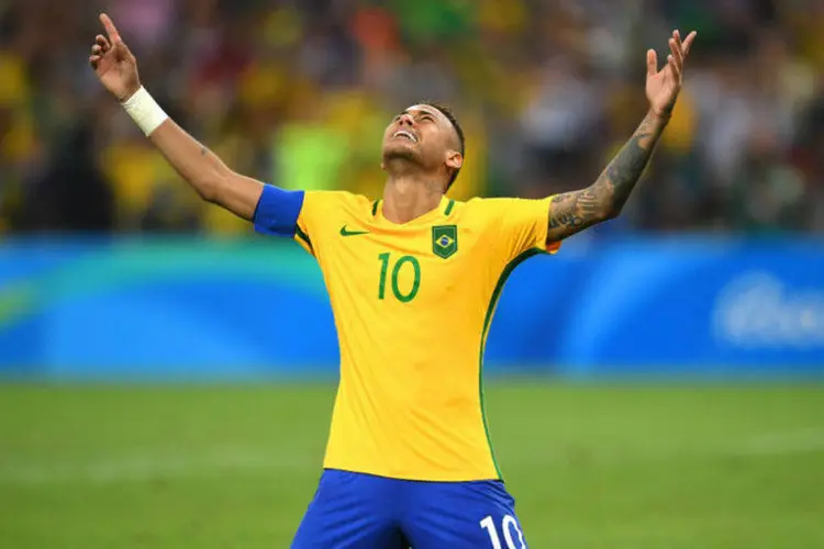Neymar: jogador comemora após acertar pênalti que deu a vitória ao time masculino de futebol, contra a Alemanha, no Rio de Janeiro, durante a Olimpíada 2016. (Laurence Griffiths/Staff/Getty Images)