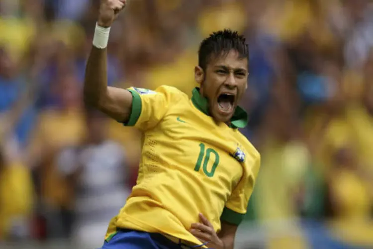 
	Neymar comemora gol sobre o Jap&atilde;o: Copa do Mundo movimenta bilh&otilde;es em neg&oacute;cios
 (REUTERS/Ueslei Marcelino)
