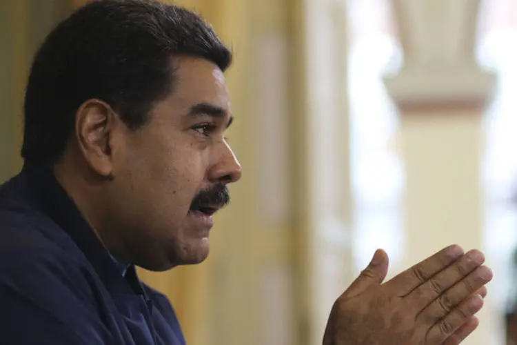 
	Nicol&aacute;s Maduro: &quot;A mudan&ccedil;a est&aacute; vindo e ningu&eacute;m pode par&aacute;-la&quot;, disse o l&iacute;der da coaliz&atilde;o Unidade Democr&aacute;tica, Jesus Torrealba
 (Reuters)