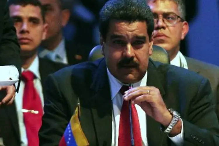 
	Nicolas Maduro: &quot;Talvez eu apare&ccedil;a em Washington nessa exposi&ccedil;&atilde;o, para mostrar o meu rosto pelo meu pa&iacute;s&quot;
 (Roberto Sanchez/AFP)
