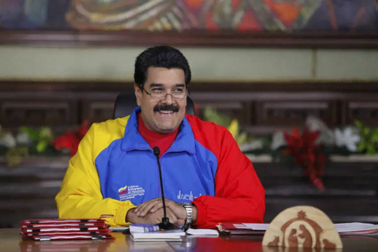 
	 O presidente Nicol&aacute;s Maduro: a economia da Venezuela est&aacute; se debatendo sob o peso de uma infla&ccedil;&atilde;o anual de mais de 60%
 (Miraflores Palace/Handout via Reuters)
