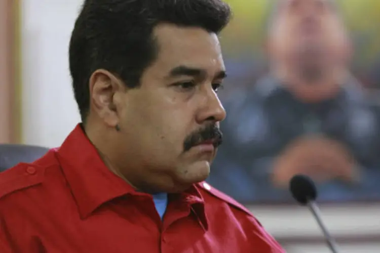 
	Nicol&aacute;s Maduro: ap&oacute;s uma in&eacute;dita primeira reuni&atilde;o preparat&oacute;ria sob ausp&iacute;cios da Unasul com a MUD, Maduro declarou que o encontro ser&aacute; um debate no qual n&atilde;o &quot;se falar&aacute; de negocia&ccedil;&atilde;o ou pacto&quot;
 (/Miraflores Palace/ Handout via Reuters)